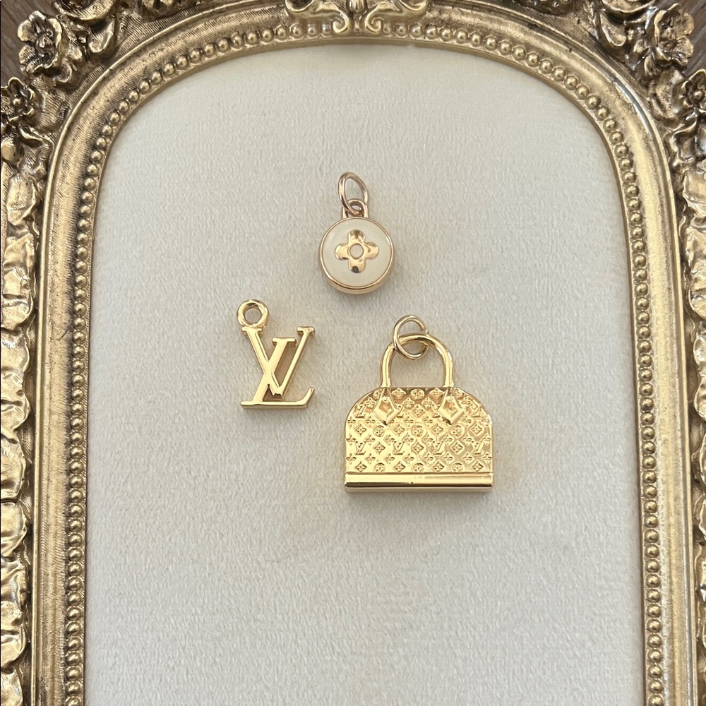 Louis Vuitton Gold and Cream Charm Trio